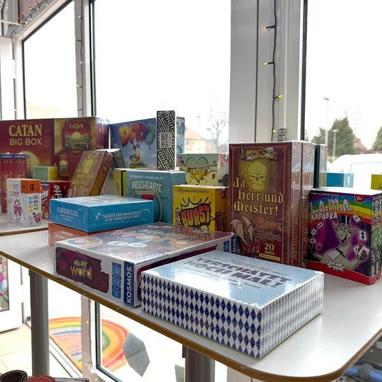 Der kleine bunte Würfelshop: Tisch neusten Spielen 